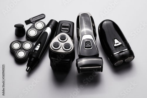 Canvas Print Different types of men's electric razor close-up isolated on white background