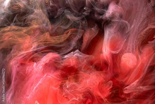 Contrasting multicolored ink abstract background. Acrylic paint backdrop for perfume, hookah, cosmetics. Mysterious smoke clouds, colorful fog
