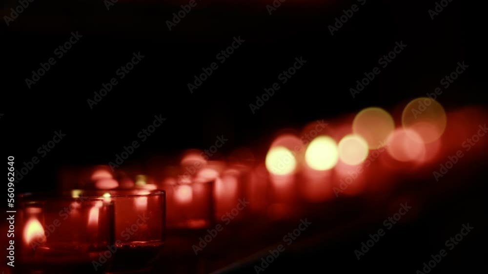 Red Wish and Pray Candles in a Catholic Church Red Wish and Pray Candles in a Catholic Church