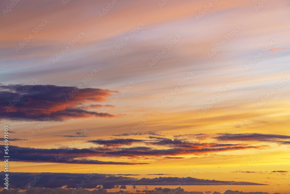 Fototapeta premium Painted clouds with pastel colors during sunset.
