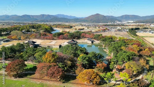 Gyeongju: Aerial view of city in South Korea, Donggung Palace & Wolji Pond, trees in autumn colors - landscape panorama of East Asia from above photo