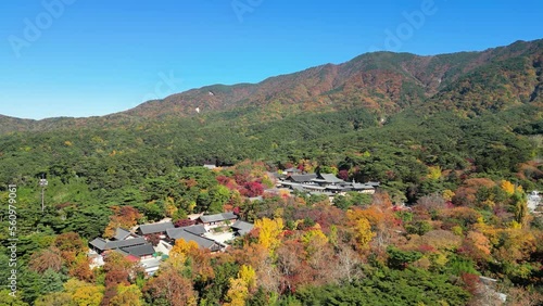 Gyeongju: Aerial view of city in South Korea, Bulguksa Buddhist temple complex on the slopes of Mount Toham, trees in autumn colors - landscape panorama of East Asia from above photo