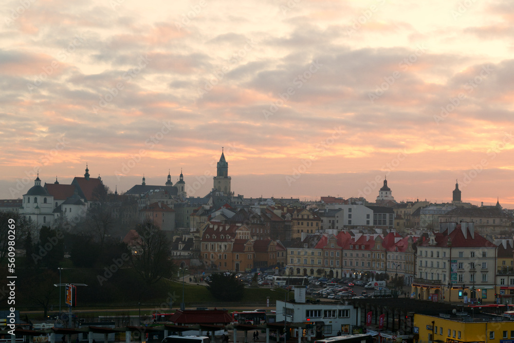 Skyline of Lublin Old Town at misty sunset in January