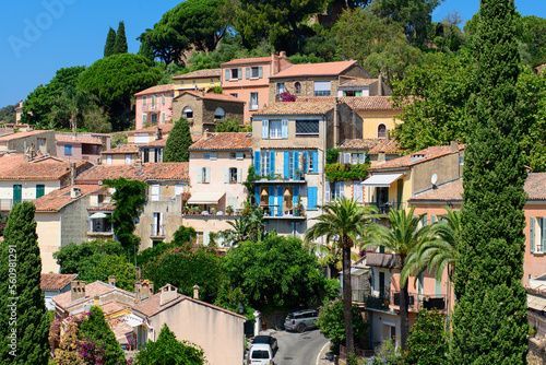 view on some houses in Bormes-les-Mimosas on a sunny summerday at the Côte d' Azur in France
