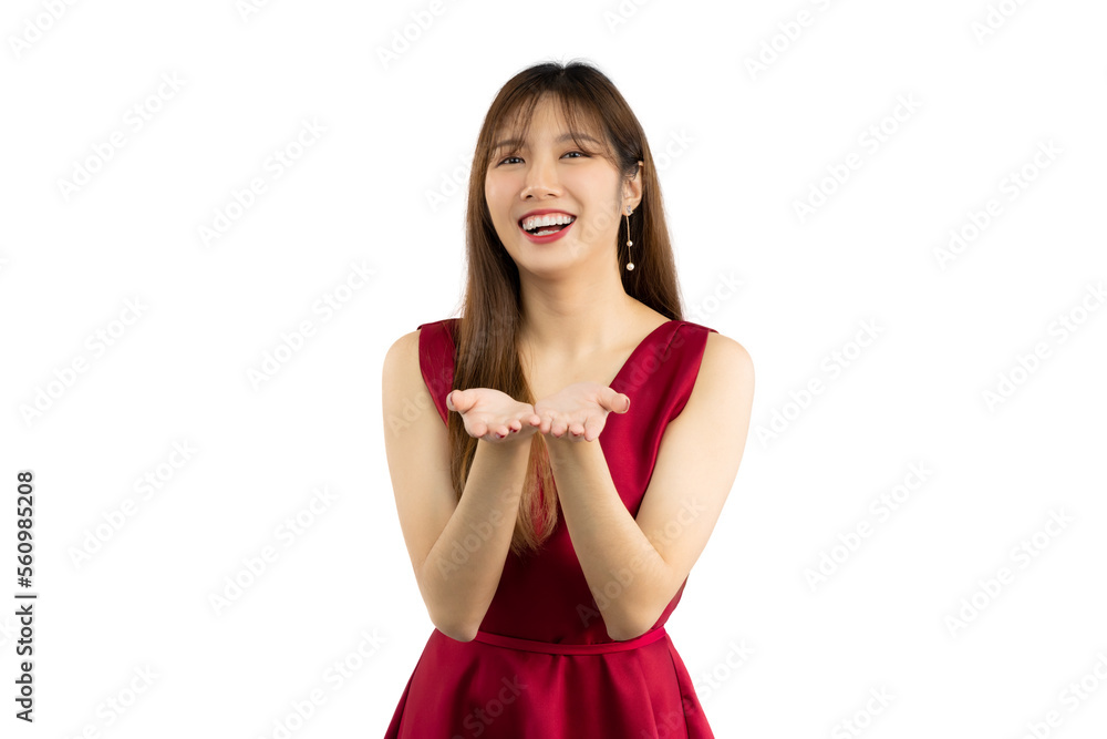 Young beautiful asian woman long hair style wear red dress posing smiling and hands pointing to you white backgtound. Young beautiful asian woman long hair style wear red dress posing smiling and hands pointing to you white backgtound.