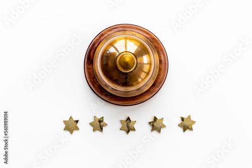 Hotel service bell with five golden stars, top view © 9dreamstudio