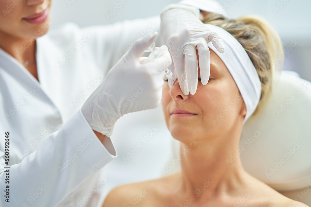 Fototapeta premium A scene of medical cosmetology treatments botulinum injection.