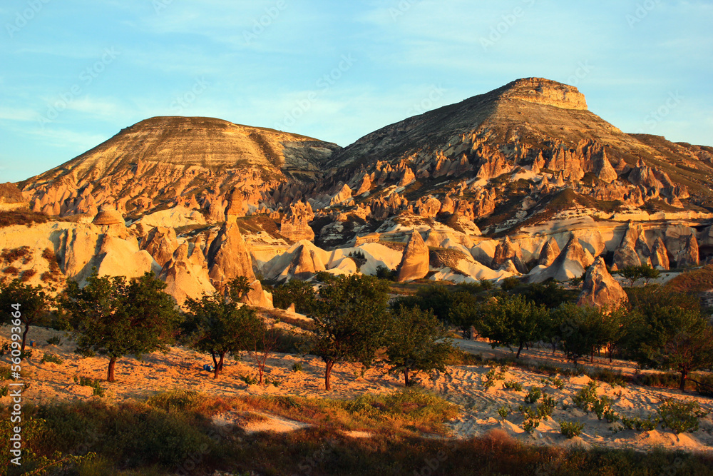 Fototapeta premium Landscape with unusual rocks and karst formations near Goreme town in Cappadocia, central Turkey