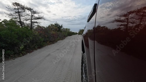 Driving on the beach in a pickup photo