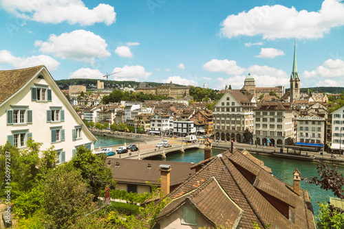 Cityscape with traditional buildings and bridge over river Limmat, Zurich, Switzerland photo