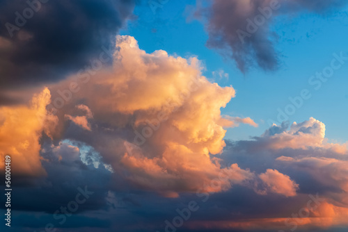 Religious image.Light from heaven,dramatic clouds, golden cloud blue sky,beautiful evening.Soft focus.
