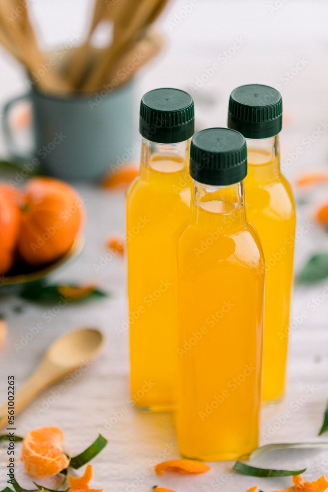 various salad vinegars in glass bottles. Front and top view. apple, lemon, strawberry, quince, grape, melon, apricot, tangerine, orange, grapefruit, various salad vinegars in glass bottles. Front and top view. apple, lemon, strawberry, quince, grape, melon, apricot, tangerine, orange, grapefruit,