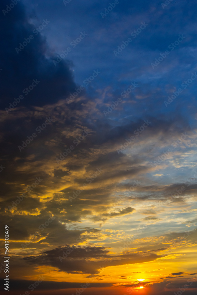 Fototapeta premium sunset sky with multicolor clouds. Dramatic twilight sky background