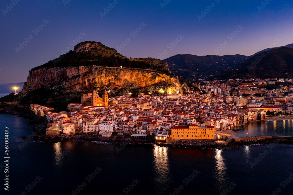 Panoramic aerial drone view of the Cefalù, Sicily, Italy by sunset night. Litttle town in Sicily near Palermo. Travel concept.