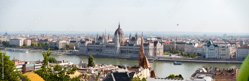 Fototapeta premium Beautiful landmarks and buildings in Budapest, Hungary. The hungarian parlament building and fishermans castle. Nice drone shots of the city.