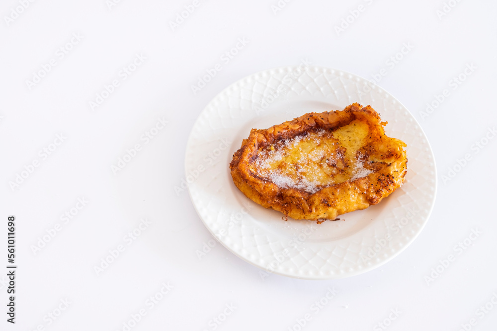 Fried French toast ,Torrijas. Typical Spanish Easter sweet. Vertical photography and selective focus Fried French toast ,Torrijas. Typical Spanish Easter sweet. Vertical photography and selective focus