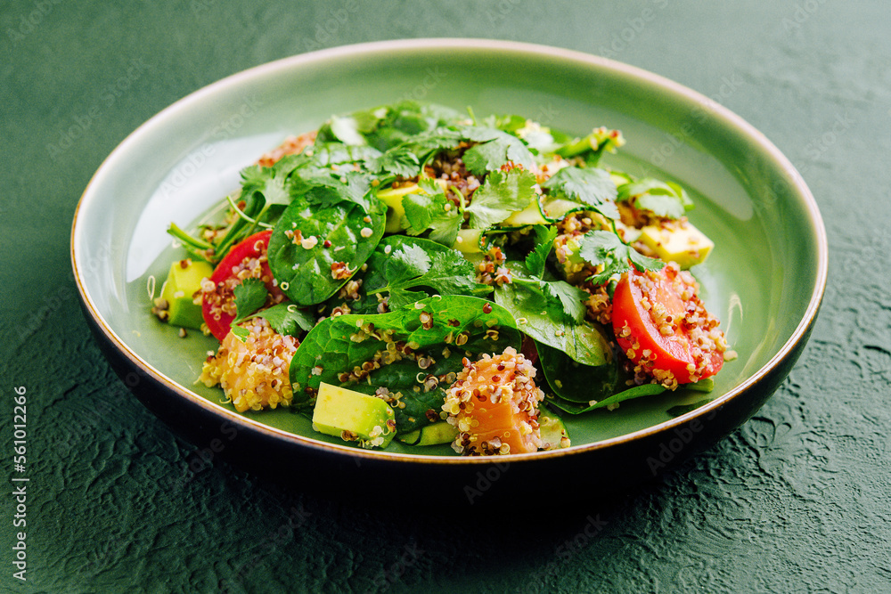 Salad with salmon, couscous, avocado and tomatoes Salad with salmon, couscous, avocado and tomatoes