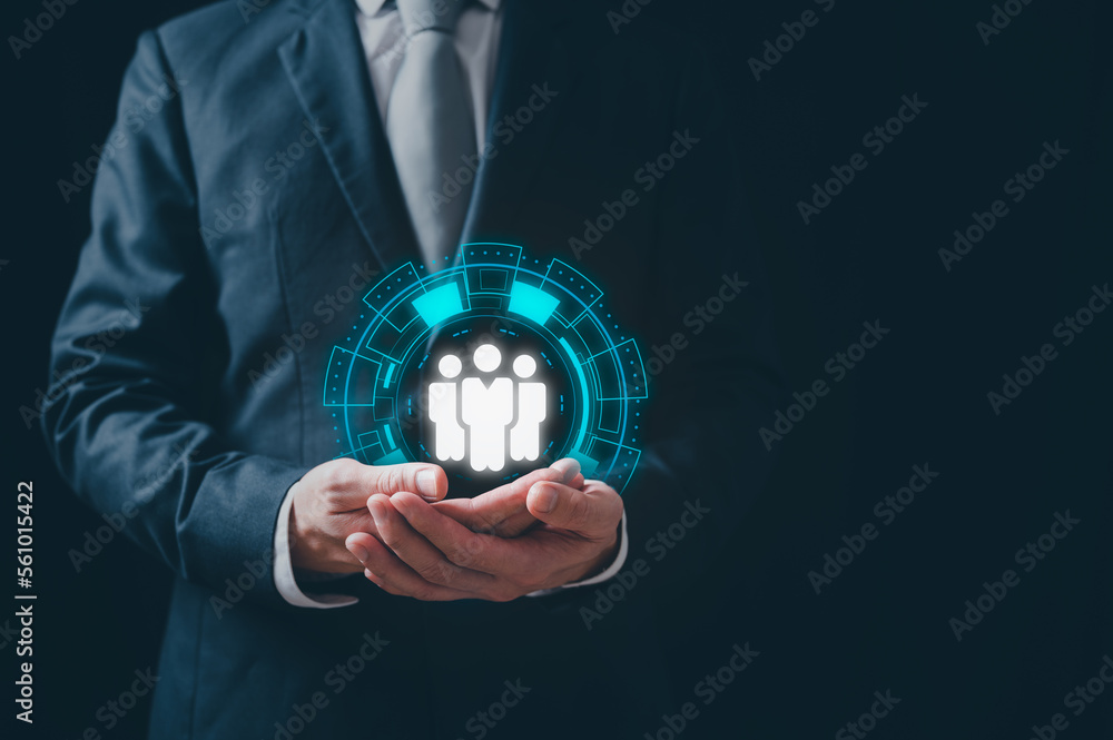 the concept of teamwork power, businessman holding icon show teamwork is important in organisation to success in business goals, working together is power leader leading the team the concept of teamwork power, businessman holding icon show teamwork is important in organisation to success in business goals, working together is power leader leading the team