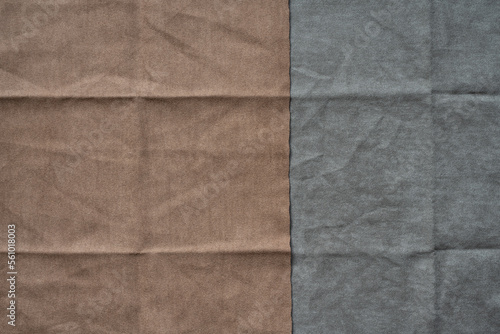 Folded brown and gray fabric texture background