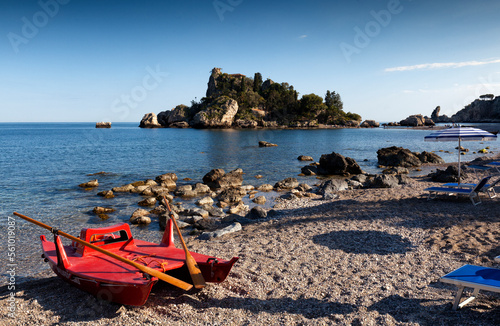 Taormina, Messina.Spiaggia con pattino verso l'Isola Bella
 photo