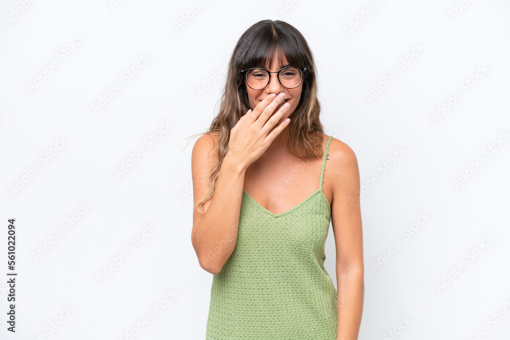 Young caucasian woman isolated on white background happy and smiling covering mouth with hand Young caucasian woman isolated on white background happy and smiling covering mouth with hand