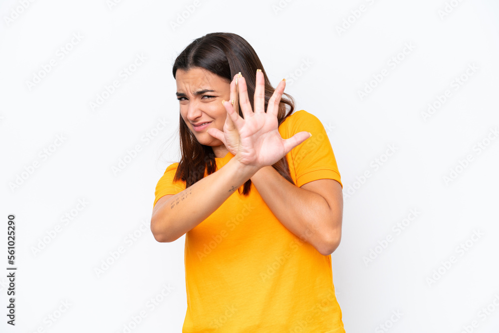 Young caucasian woman isolated on white background nervous stretching hands to the front Young caucasian woman isolated on white background nervous stretching hands to the front