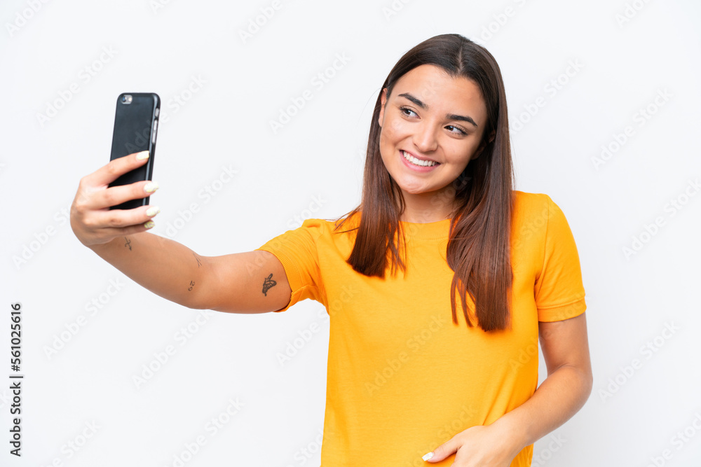 Young caucasian woman isolated on white background making a selfie Young caucasian woman isolated on white background making a selfie
