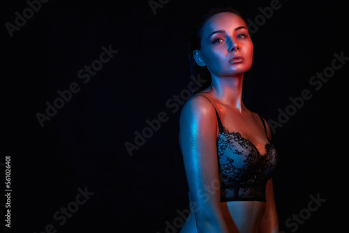 Beautiful sexy wet Girl in color bright lights