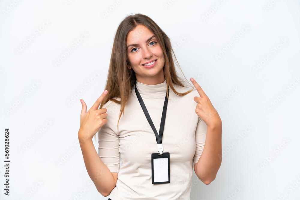 Young pretty woman with ID card isolated on white background giving a thumbs up gesture Young pretty woman with ID card isolated on white background giving a thumbs up gesture