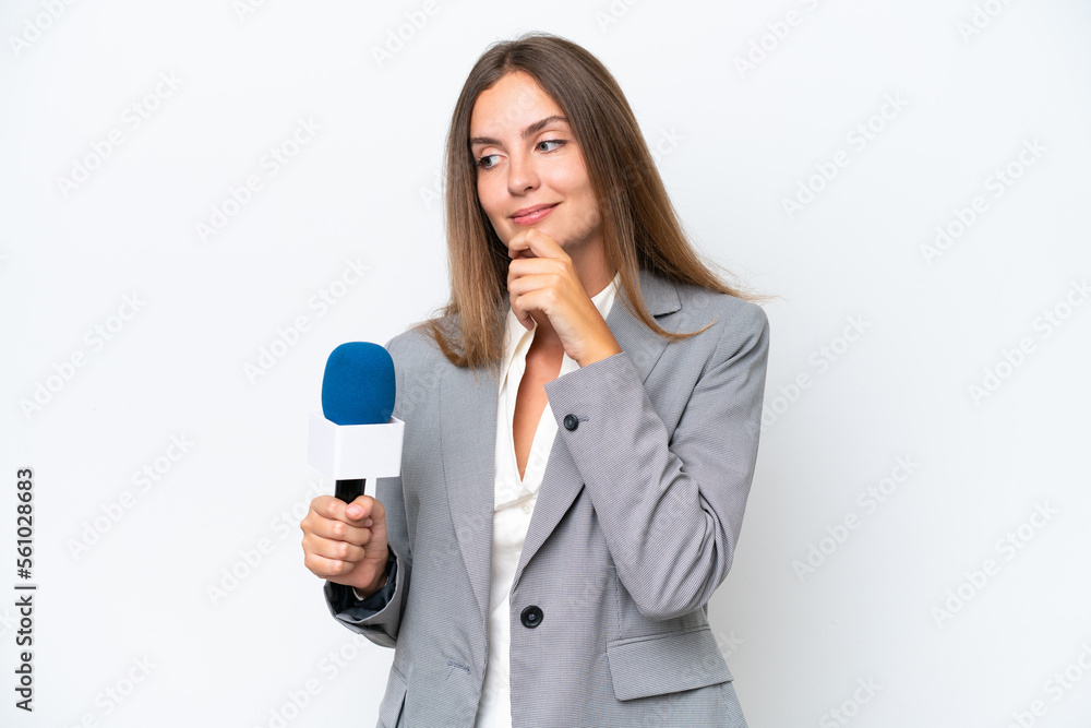 Young TV presenter caucasian woman isolated on white background looking to the side and smiling Young TV presenter caucasian woman isolated on white background looking to the side and smiling