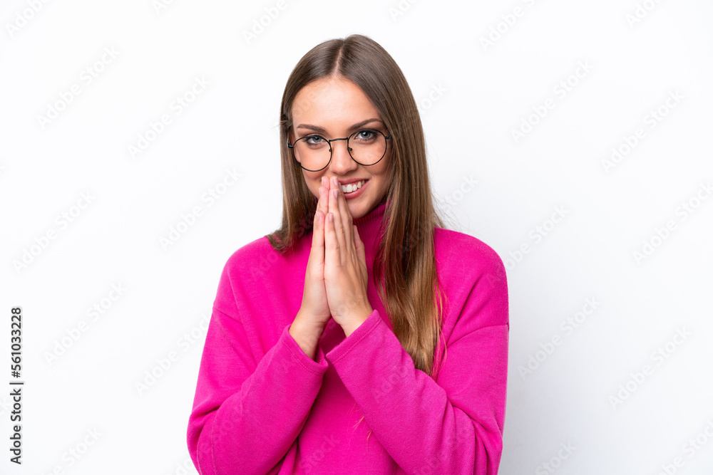 Young caucasian woman isolated on white background keeps palm together. Person asks for something Young caucasian woman isolated on white background keeps palm together. Person asks for something