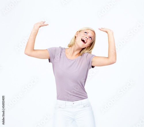 Pressure, heavy and mockup with a woman in studio isolated on a white background being weighed down. Fear, shouting and a female holding a weight or product on blank marketing and advertising space