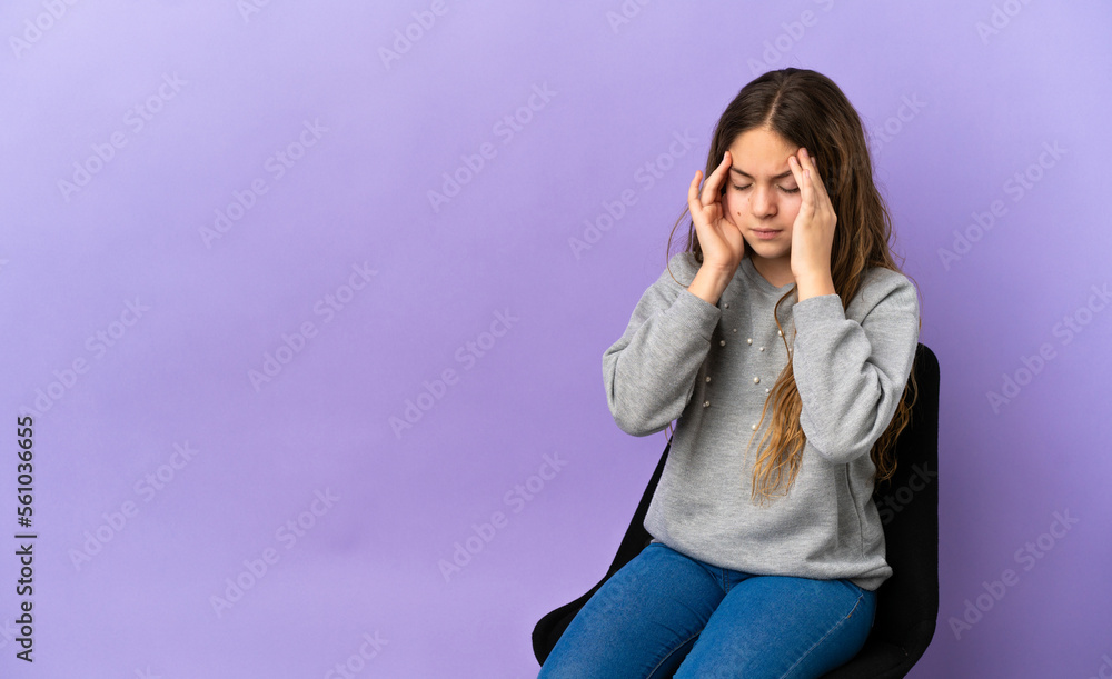Little caucasian girl sitting on a chair isolated on purple background with headache Little caucasian girl sitting on a chair isolated on purple background with headache