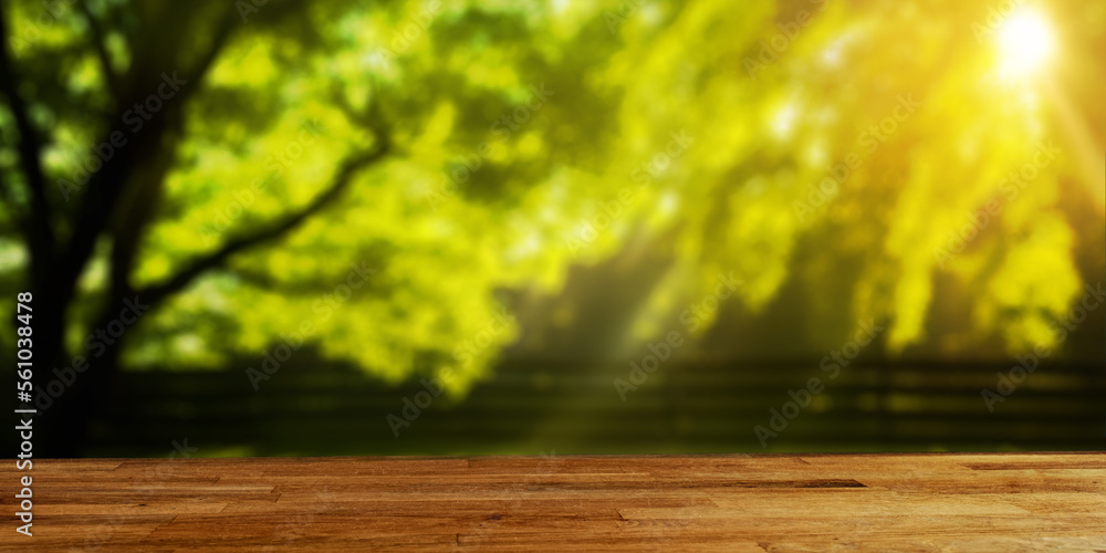 3D Illustration of natural wooden table and green blurry forest background 3D Illustration of natural wooden table and green blurry forest background