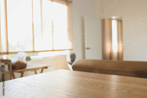 wood table and blurry room background