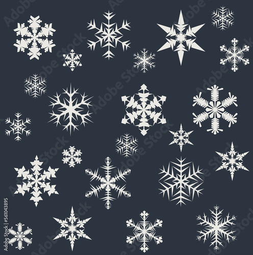 Lace pattern of white snowflakes on a dark gray background. A unique author's snowflake to decorate the winter holidays. Vector image of a Christmas symbol.