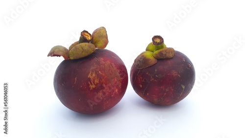 Close up of ripe mangosteen fruit isolated on white background