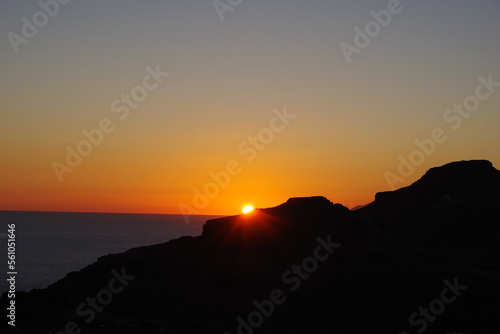Sundown over hill at mediterranean sea. © Timo