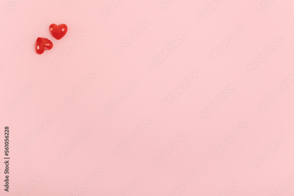 Red hearts on a pink background.