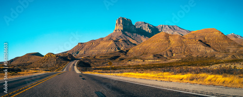 Guadalupe Mountains National Park landscape near El Captain Viewpoint on Route 62 in Salt Flat, Dell City, Texas, USA, panoramic retro-style autumn road scenery with golden grasses