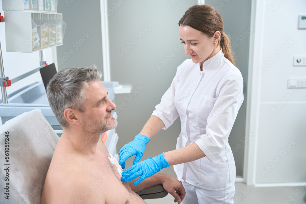 Fototapeta premium Man undergoes a check-up in a hospital
