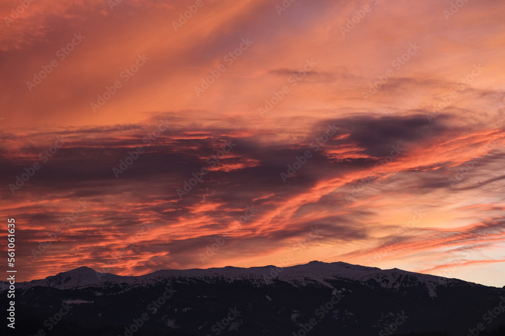 sunset over the austrian mountains sunset over the austrian mountains
