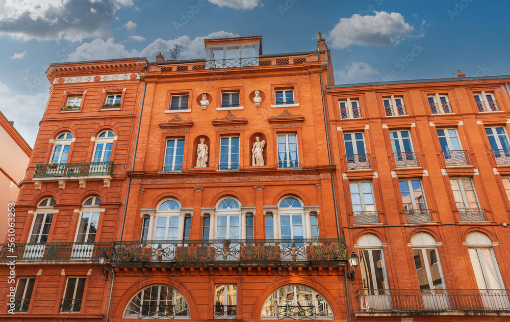 Fototapeta premium Facades of buildings in trinity square in Toulouse, Occitanie, France