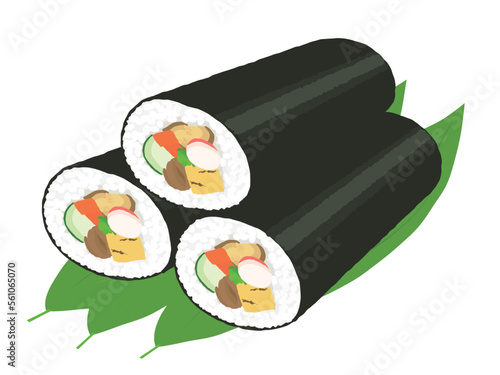 笹葉の上に置いた太巻き寿司3本