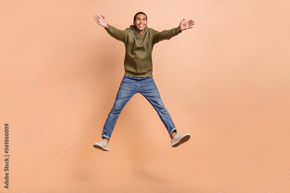Full length photo of overjoyed positive man wear stylish outfit open hands glad see you good mood isolated on beige color background