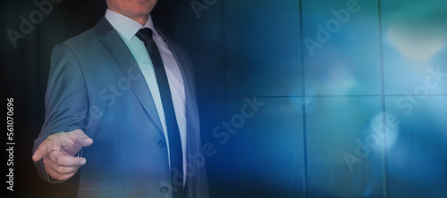 Businessman touching or pointing at something with forefinger.