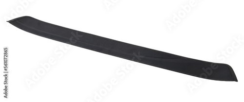 A black plastic decorative door sills in an automobile parsing for sale or repair in a workshop on a white isolated background in a photo studio.
