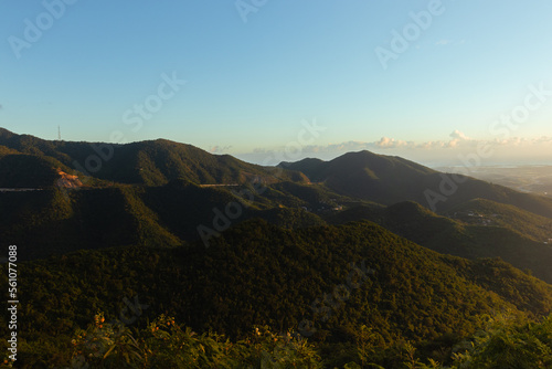 Beautiful green hills road landscape on golden hour from puerto rico