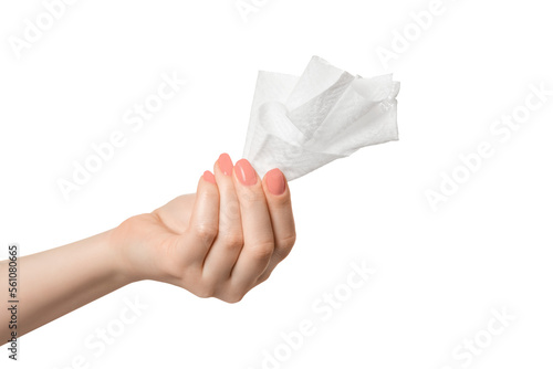 Woman's hand with paper napkin on a white background, isolate.