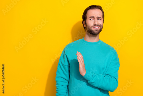 Slika na platnu Photo of doubtful moody guy dressed teal outfit rising hand arm saying no empty